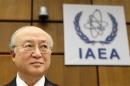 IAEA Director General Amano waits for start of a board of governors meeting at the IAEA headquarters in Vienna