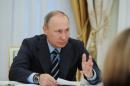 Russian President Putin meets members of Central Election Commission in Moscow