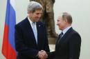 Russian President Putin welcomes U.S. Secretary of State Kerry during meeting at Kremlin in Moscow