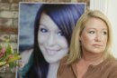 Sheila Pott poses with a portrait of her daughter Audrie in Los Altos, Calif., Thursday, May 23, 2013. Audrie Pott committed suicide in September 2012 after being sexually assaulted by three boys during a house party in Saratoga, Calif. Photos of the incident were circulated around Pott's high school prompting the teenager to hang herself in a bathroom at home. (AP Photo/Marcio Jose Sanchez)