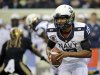 Navy quarterback Keenan Reynolds runs with the ball during the first half of an NCAA college football game against Army, Saturday, Dec. 8, 2012, in Philadelphia. (AP Photo/Matt Slocum)