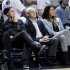 PSU's charged ex-president sits front row at game