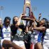CORRECTS TO KANSAS NOT KANSAS STATE - Kansas women's track team celebrates after winning the NCAA outdoor track and field championships in Eugene, Ore., Saturday, June 8, 2013. (AP Photo/Don Ryan)