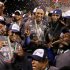 Players from the Dominican Republic celebrate with the trophy after they defeated Puerto Rico in the final to win the World Baseball Classic in San Francisco
