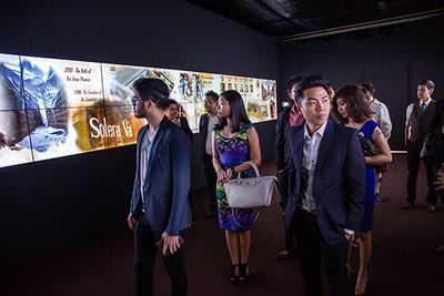 Guests enter the distillery and through the timeline tunnel