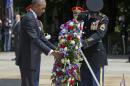 President Barack Obama lays a wreath at the Tomb of the Unknowns, on Memorial Day, Monday, May 30, 2016, at Arlington National Cemetery in Arlington, Va. (AP Photo/Pablo Martinez Monsivais)