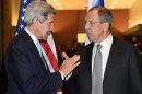 US State Secretary John Kerry (L) and Russian Foreign Minister Sergey Lavrov talk at the UN General Assembly in New York, September 24, 2013