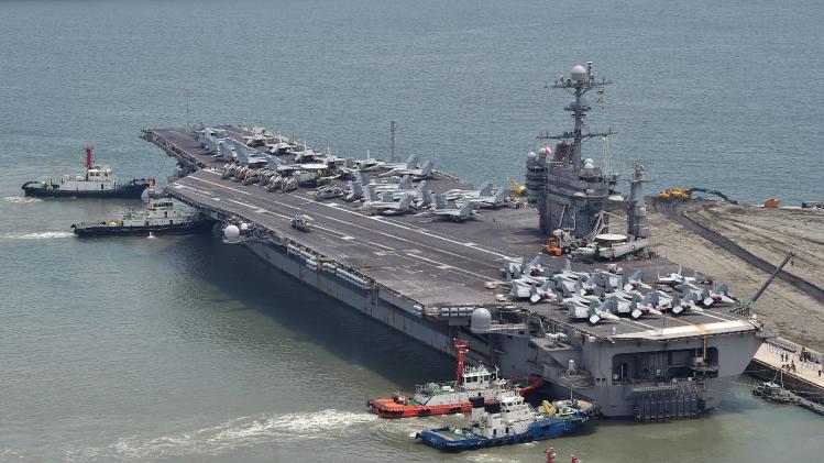 US aircraft carrier the USS George Washington arrives at the southeastern port city of Busan, South Korea on July 11, 2014