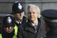 Julian Assange, the 40-year-old WikiLeaks founder, arrives at the Supreme Court in London, Wednesday, Feb. 1, 2012. Assange's legal team is making a final effort at Britain's Supreme Court to avoid his extradition to Sweden. Assange is wanted by Swedish authorities over sex crimes allegations stemming from a visit to the country in 2010. He denies any wrongdoing.(AP Photo/Kirsty Wigglesworth)