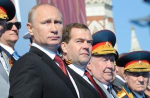 Russian President Vladimir Putin (left) and Prime Minister …