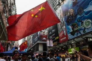 Pro-Beijing activists wave China&#39;s national flag&nbsp;&hellip;