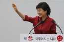 Park Geun-hye, lawmaker of the ruling Saenuri Party, waves toward her supporters during an event to launch her bid to become president in Seoul