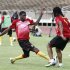 Cameroon's Mohamadou Idrissou (L) and teammate Rigobert Song participate in a training session at the Kasarani stadium in Kenya's capital Nairobi