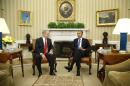 Netanyahu and Obama sit down to a meeting in the Oval Office of the White House in Washington