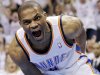 Oklahoma City Thunder point guard Russell Westbrook reacts after dunking the ball against the San Antonio Spurs during the first half of Game 6 in the NBA basketball Western Conference finals, Wednesday, June 6, 2012, in Oklahoma City. (AP Photo/Sue Ogrocki)