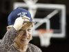 North Carolina coach Sylvia Hatchell wears a hat in honor of her 900th career win, following North Carolina's 80-52 win over Boston College in an NCAA college basketball game in Boston on Thursday, Feb. 7, 2013. (AP Photo/Winslow Townson)