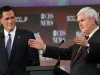 Republican presidential candidates Newt Gingrich,  left, speaks as Mitt Romney,  listens during the CBS News/National Journal foreign policy debate at the Benjamin Johnson Arena, Saturday, Nov. 12, 2011 in Spartanburg, S.C. (AP Photo/Richard Shiro)