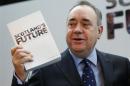 Scotland's First Minister Alex Salmond holds the referendum white paper on independence in Scotland