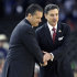 FILE - in this March 31, 2012, file photo,  Louisville head coach Rick Pitino, right, shakes hands with Kentucky head coach John Calipari before the first half of an NCAA Final Four semifinal college basketball tournament game in New Orleans. Kentucky has fallen out of the Top 25 and the defending national champs are still looking to establish themselves heading into the instate showdown with rival Louisville. The fourth-ranked Cardinals Saturday will try to end a four-game skid against the Wildcats. (AP Photo/David J. Phillip, File)