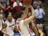 Ohio State guard Aaron Craft (4) shoots the game-winning basket against Iowa State in a third-round game of the NCAA college basketball tournament on Sunday, March 24, 2013, in Dayton, Ohio. Ohio State won 7-75. (AP Photo/Al Behrman)