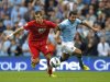 Southampton's French player Morgan Schneiderlin (L) and Manchester City's Argentinian player Carlos Tevez