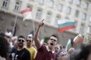 Protesters shout anti-government slogans during a demonstration in central in Sofia