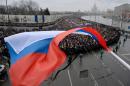 Tens of thousands of people marched in central Moscow for a rally in memory of murdered Kremlin critic Boris Nemtsov, on March 1, 2015