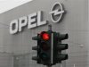 A traffic light is pictured in front of the Opel plant in Bochum