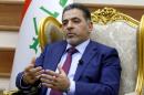 Iraqi Interior Minister Mohammed Salem al-Ghabban speaks during an interview with Reuters in Baghdad