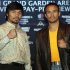 Boxers Juan Manuel Marquez, right, and Manny Pacquiao pose for pictures during a news conference in New York, Wednesday, Sept. 19, 2012. The boxers are promoting their fourth fight, scheduled for Dec. 8, 2012 in Las Vegas. (AP Photo/Seth Wenig)