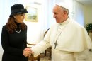 In this photo provided by the Vatican paper L'Osservatore Romano, Pope Francis meets Argentine President Cristina Fernandez at the Vatican, Monday, March 18, 2013. Pope Francis' diplomatic skills were put to the test Monday as he met with Argentine President Cristina Fernandez, with whom he has clashed over her socially liberal policies and what he has called the government's totalitarianism. Fernandez called on the former Archbishop of Buenos Aires Monday at his temporary home, the Vatican hotel on the edge of the Vatican gardens, and the two later lunched together, a day before she and other world leaders attend his installation Mass in St. Peter's Square that some estimates say could bring 1 million people to Rome. (AP Photo/L'Osservatore Romano)