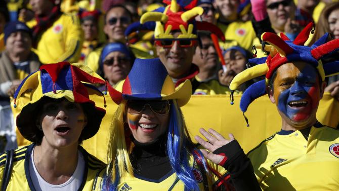 Colombia fans celebrate ahead of their team&#39;s first round Copa America 2015 soccer match against Venezuela at Estadio El Teniente in Rancagua
