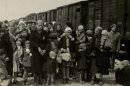 In this May 1944 photo provided by Yad Vashem Photo Archives, Jewish women and children deported from Hungary, separated from the men, line up for selection on the selection platform at Auschwitz camp in Birkenau, Poland. Johann 