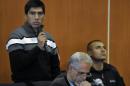 Defendant Gustavo Lasi speaks in court in Salta, Argentina, on June 2, 2014