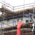 Workers erect steel on a construction site in Leicester