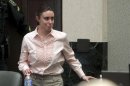 Casey Anthony smiles as she returns to the defense table after being acquitted on first degree murder charges of her daughter Caylee at the Orange County Courthouse Orlando