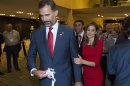 Spain's Crown Prince Felipe and and Princess Letizia leave after Madrid's 2020 final presentation in 125 IOC session in Buenos Aires, Argentina, Saturday, Sept. 7, 2013. Madrid has been eliminated as a host city for the 2020 Olympics, leaving Tokyo and Istanbul to advance to the final round. Madrid initially tied with Istanbul as an also-ran in the voting by the International Olympic Committee. Istanbul won the tiebreak vote 49-45. The winner will now be determined in a second-round vote between the Japanese and Turkish cities.(AP Photo/Ivan Fernandez)