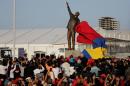 Statue of Venezuela's late President Hugo Chavez is unveiled during an event in Porlamar