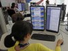 People work at a call center in Lisbon on the outskirts of Lisbon