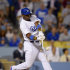 Los Angeles Dodgers' Yasiel Puig hits an RBI single during the eighth inning of their baseball game against the San Francisco Giants, Monday, June 24, 2013, in Los Angeles. (AP Photo/Mark J. Terrill)