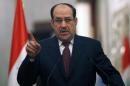 Iraqi Prime Minister Nuri al-Maliki gives press conference in Baghdad on January 13, 2014