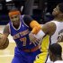 Indiana Pacers forward Paul George, right, gets tangled up with New York Knicks forward Carmelo Anthony during the first half of Game 3 of the Eastern Conference semifinal NBA basketball playoff series in Indianapolis, Saturday, May 11, 2013.  (AP Photo/Michael Conroy)