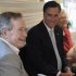 Republican presidential candidate, former Massachusetts Gov. Mitt Romney, center, visits with former President George H.W. Bush and his wife Barbara at their Houston home, Thursday, Dec. 1, 2011. (AP Photo/Pat Sullivan)