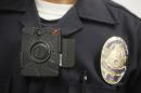FILE - In this Jan. 15, 2014 file photo, a Los Angeles Police officer wears an on-body camera