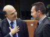 French Finance Minister Pierre Moscovici, left, speaks with Greek Finance Minister Yannis Stournaras during a meeting of eurogroup finance ministers in Brussels on Tuesday, Nov. 20, 2012. European Union officials will make a fresh try Tuesday to reaching a political accord on desperately needed bailout loans to Greece, an agreement that eluded them last week. (AP Photo/Thierry Charlier)