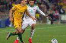 Australia's Trent Sainsbury (left) battles for the ball with Iraq's Ahmed Yasin during their World Cup qualifier in Perth on September 1, 2016