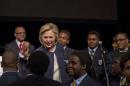 Democratic presidential candidate Hillary Clinton greets students of the Eagle Academy during the Foundation's annual fundraising breakfast, Friday, April 29, 2016, in New York. (AP Photo/Mary Altaffer)