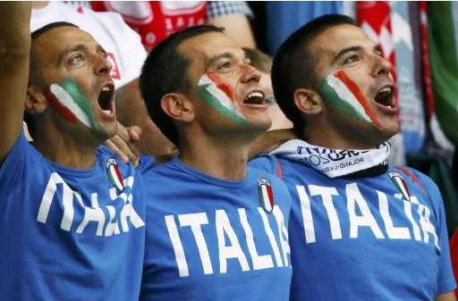Italy's fans cheer before their Euro 2012 semi-final soccer match against Germany at the National stadium in Warsaw