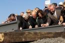 File photo of California Governor Jerry Brown and his wife Anne Gust during a ceremony for the California High Speed Rail in Fresno