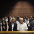 The family of Olympic athlete Oscar Pistorius,  front row from left to right, sister Aimee, brother Carl and  father Henke Pistorius, at the magistrate court in Pretoria, South Africa, Wednesday, Feb. 20, 2013.  Oscar Pistorius arrived at the court building in a police car with a blue blanket covering his head Wednesday as prosecutors prepared to detail why they are charging him with premeditated murder in the shooting death of his girlfriend. Prosecutors want to show why he should be denied bail. Pistorius denies the charge, and said it was an accidental shooting.  Pistorius is charged with premeditated murder for the Feb. 14 shooting death of model Reeva Steenkamp at his upscale home in the eastern suburbs of the South African capital, Pretoria. (AP Photo/Themba Hadebe)